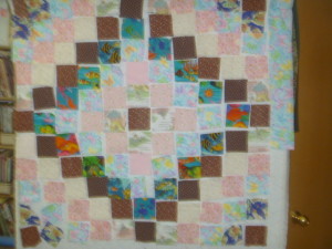 P1010815 laying out baby quilt